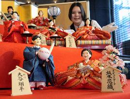 Traditional "hina" dolls featuring big names in Japan
