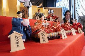 Traditional "hina" dolls featuring big names in Japan