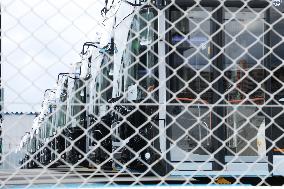 Approximately 150 EV buses gathered at a vast site in Morinomiya, Osaka.