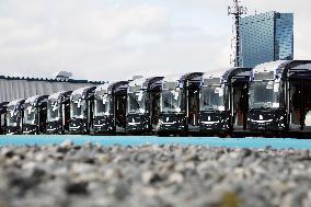 Approximately 150 EV buses gathered at a vast site in Morinomiya, Osaka.