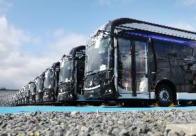 Approximately 150 EV buses gathered at a vast site in Morinomiya, Osaka.