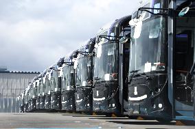 Approximately 150 EV buses gathered at a vast site in Morinomiya, Osaka.