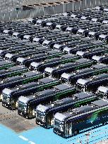 Approximately 150 EV buses gathered at a vast site in Morinomiya, Osaka.