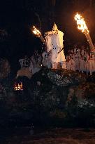 Ritual to pour holy water into river in Japan