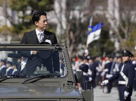 Japan defense chief attends troop inspection ceremony