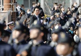 Japan defense chief attends troop inspection ceremony