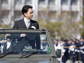 Japan defense chief attends troop inspection ceremony