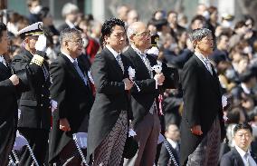 Japan defense chief attends troop inspection ceremony