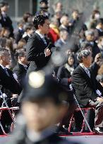 Japan defense chief attends troop inspection ceremony