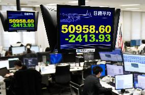 Tokyo stocks tumble