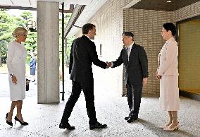 Japan emperor, empress meet with French President Macron, wife