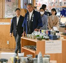CORRECTED: Japan imperial family's trip to Fukushima