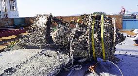 Japanese World War II fighter salvaged from sea