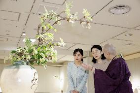 Princesses at flower arrangement exhibition