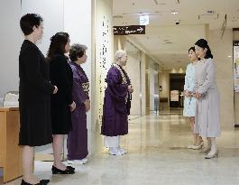 Princesses at flower arrangement exhibition