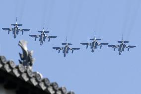 Blue Impulse aerobatic team flies over Kumamoto