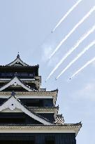 Blue Impulse aerobatic team flies over Kumamoto