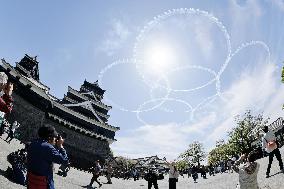 Blue Impulse aerobatic team flies over Kumamoto