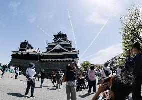 Blue Impulse aerobatic team flies over Kumamoto