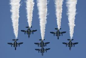 Blue Impulse aerobatic team flies over Kumamoto