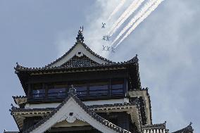 Blue Impulse aerobatic team flies over Kumamoto