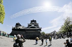 Blue Impulse aerobatic team flies over Kumamoto