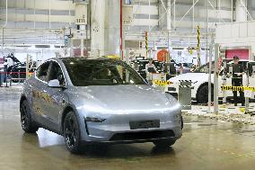 Tesla unveils Shanghai factory to media