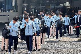 Football: North Korean team enroute to South Korea