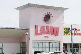 La Mu sign and logo