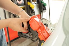 Soaring Gas Prices: A Scene at the Gas Station