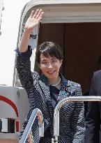 Japan PM Takaichi returns home