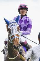 Horse racing: female jockey wins Japanese Oaks