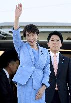 Japanese PM Takaichi arrives in Italy