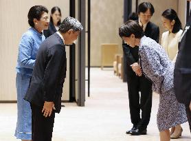 Emperor, empress return home