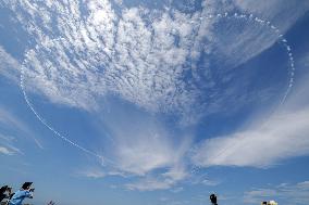 Blue Impulse aerobatic team flies over quake-hit Wajima