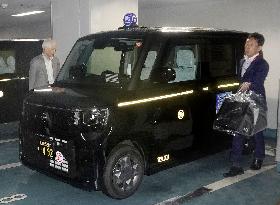 Japan's first gas-powered mini taxi
