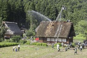 Thatched-roof house catches fire in World Heritage-listed village