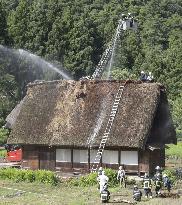 Thatched-roof house catches fire in World Heritage-listed village