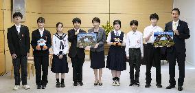 Great-grandchildren of former residents of Russian-held islands
