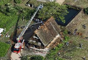 Thatched-roof house catches fire in World Heritage-listed village