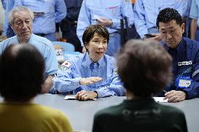 Japan PM Takaichi visits quake-hit Kumamoto