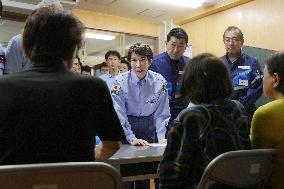 Japan PM Takaichi visits quake-hit Kumamoto