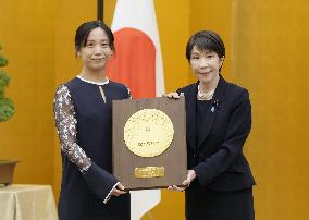 10-time Olympic skating medalist Takagi given People's Honor Award
