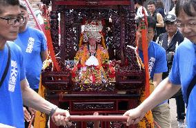 Sea goddess procession in Oma