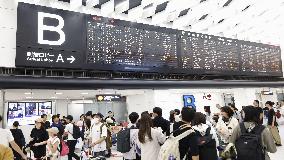 Return rush of "bon" summer holidaymakers in Japan