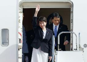 Japan PM Takaichi returns home