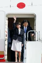 Japan PM Takaichi returns home